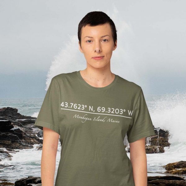 woman on a rocky coastline wearing a shirt that says Monhegan Island, Maine below 43.7623° N, 69.3203° W
